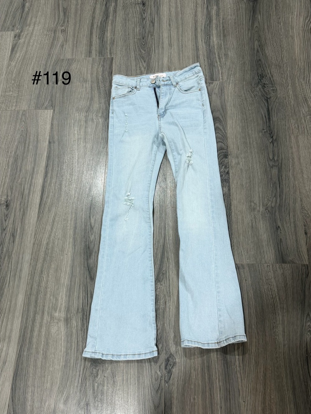 Light Wash Women's Flare Jeans with Subtle Distressing